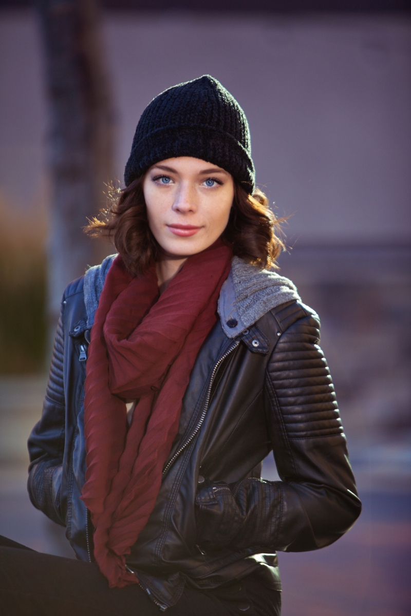 Senior portrait with a leather jacket and burgundy scarf